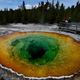 Tourists view the Morning Glory hot spring in the Upper Geyser Basin of Yellowstone National Park in Wyoming.